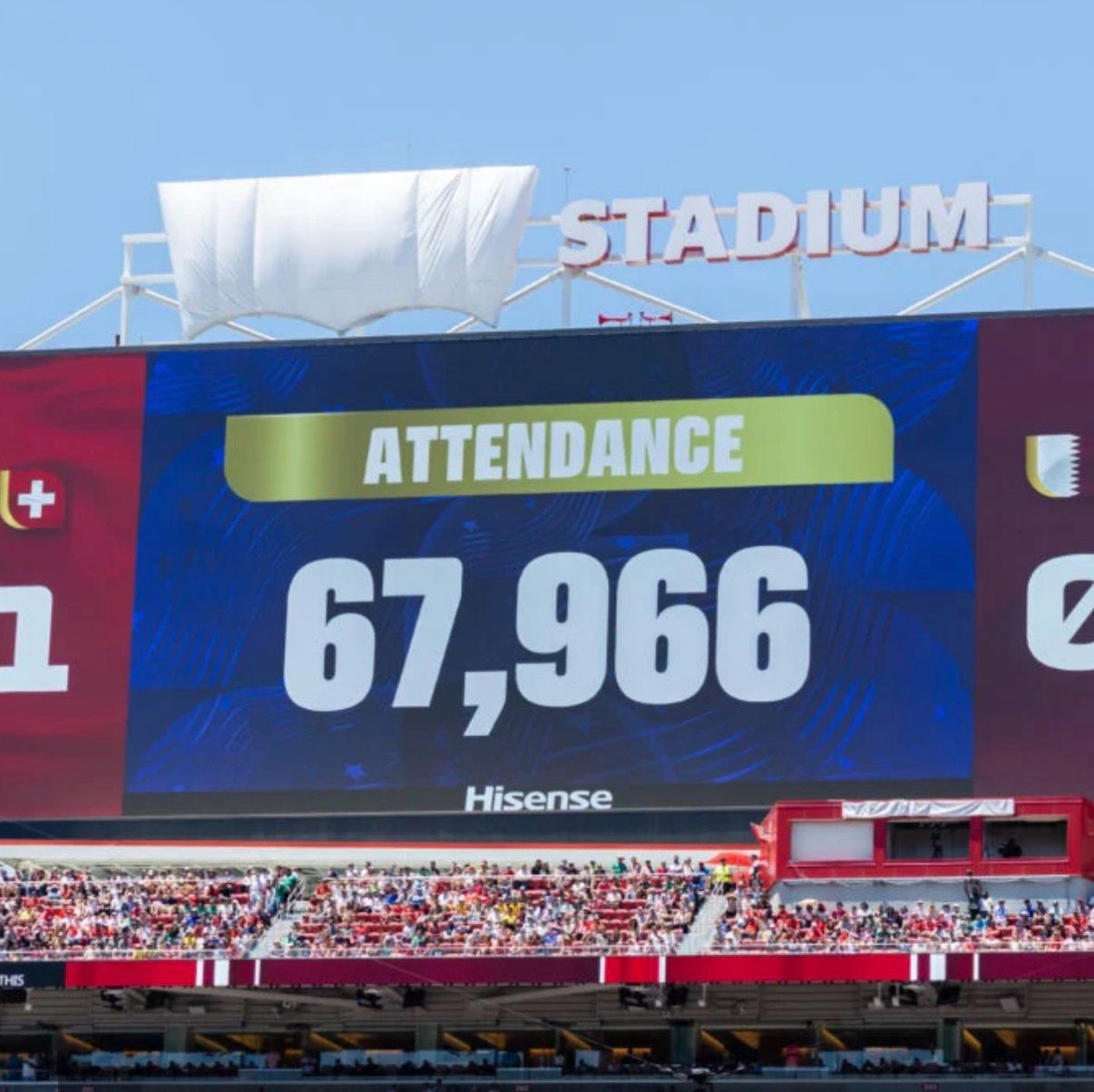 Levi’s Stadium sign covered by a white sheet, leaving the familiar batwing logo shape visible.